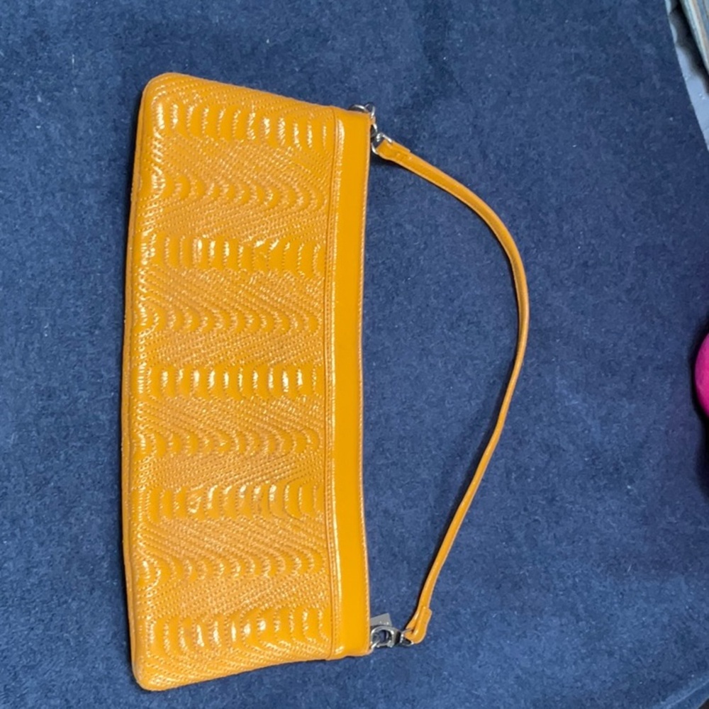 HOBO Orange Clutch with Textured Design